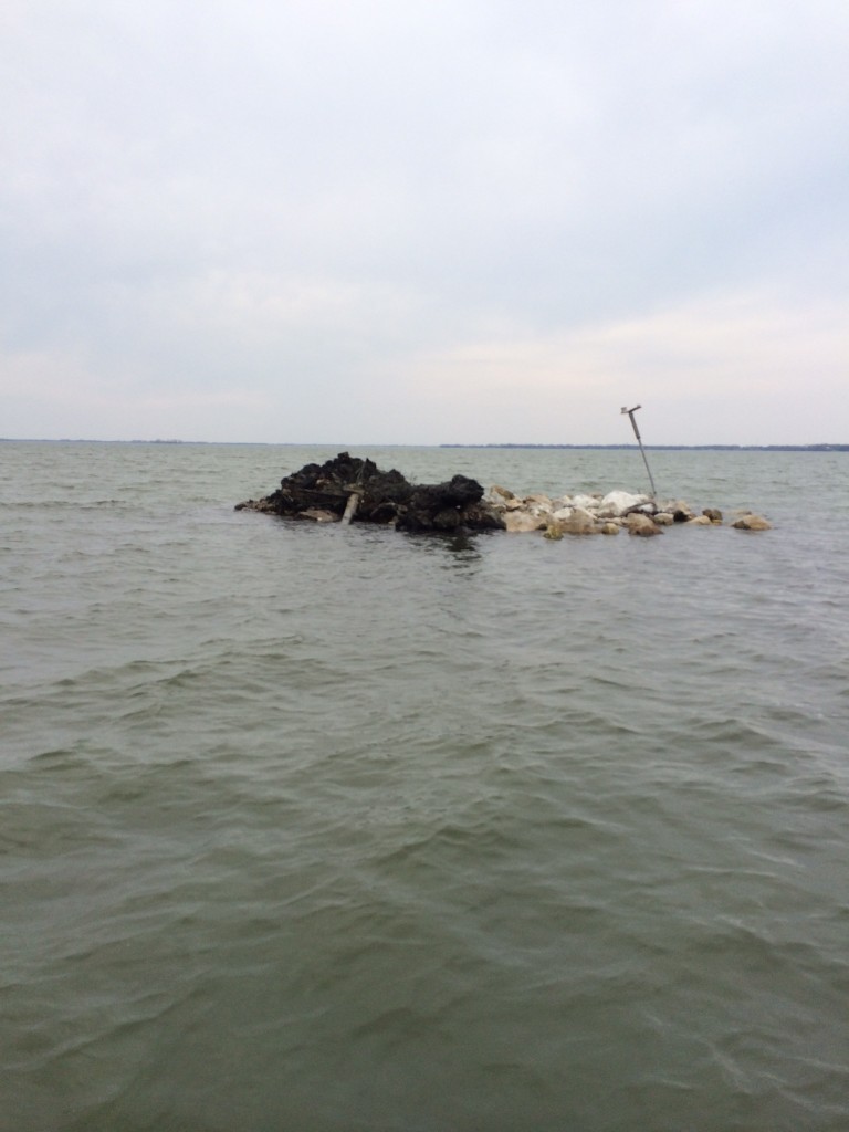 This is a picture of last remaining Oil Derrick site on Grand lake St Marys taken on 4-17-14 after pulling up remaining rock. The Grand Lake Recreation Club with state parks will be loading dump trucks of rock onto state barges and floating them out to derrick. After rock hauling is complete the Rec Club will be floating concrete trucks out to derrick and locking rock together with concrete to increase durability. To safeguard local boaters and provide another navigational point we will be placing a derrick replica with flashing light on top. The final stage of this project will be the GLSM State Parks driving wood post on west side of derrick to hinder ice damage, prolong derrick stability, and create fishing habitat.The GLRC is looking for donations of rock, trucking, or funds to help get this task accomplished. Please contact Brad Fisher @ 937-361-9540 or email @ grandlakerec@gmail.com. For more information go to grandlakerecclub.com and like us on FB. 